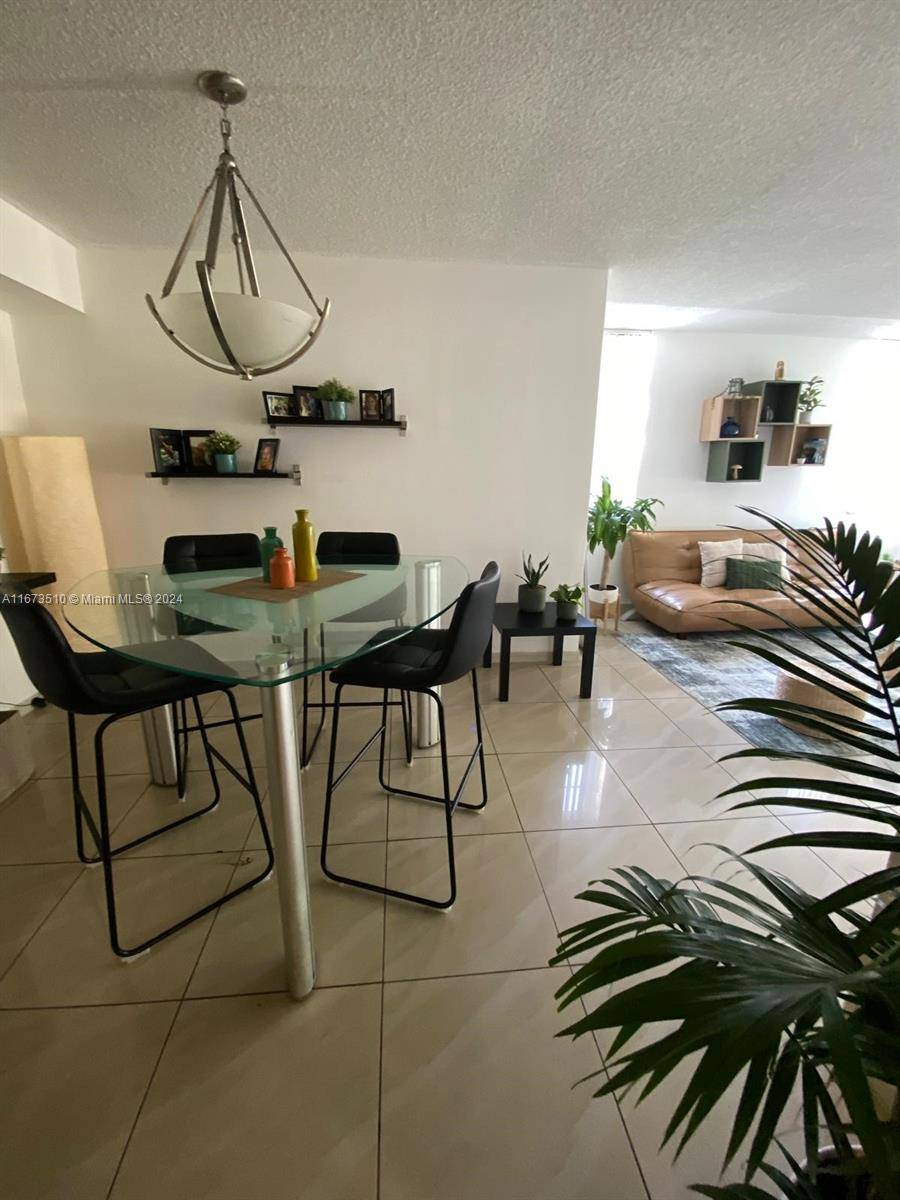 4440 NW 107th AveDoral - ENCLAVE AT DORAL CONDO NO condo unit 101-7 - picture