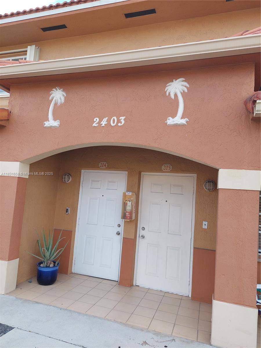2403 W 76th StHialeah - Condo 1-4 Stories,Condo condo unit 203 - picture
