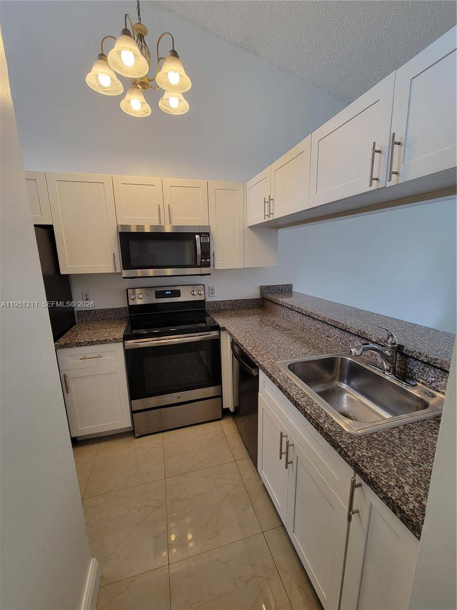 958 Coral Club DrCoral Springs - Condo 1-4 Stories,Condo condo unit 958 - picture