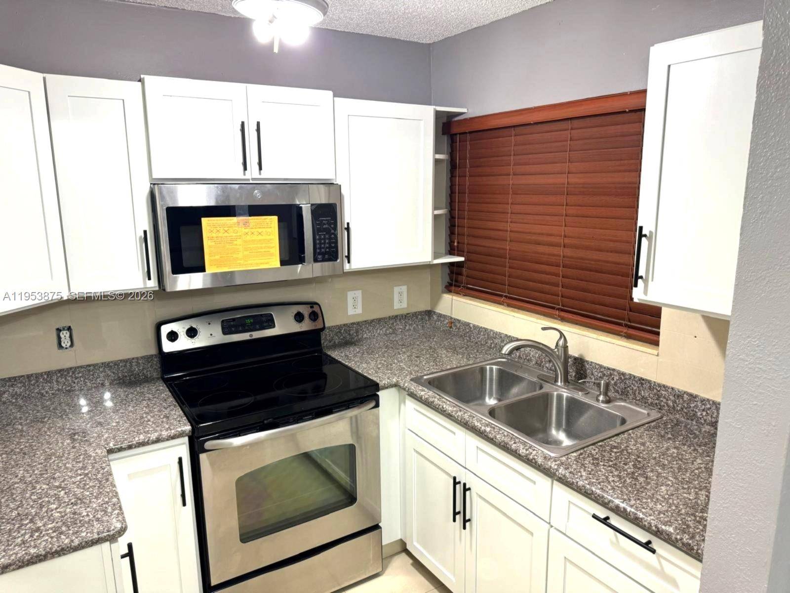 5461 W 24th AveHialeah - Condo 1-4 Stories,Condo condo unit 25 - picture