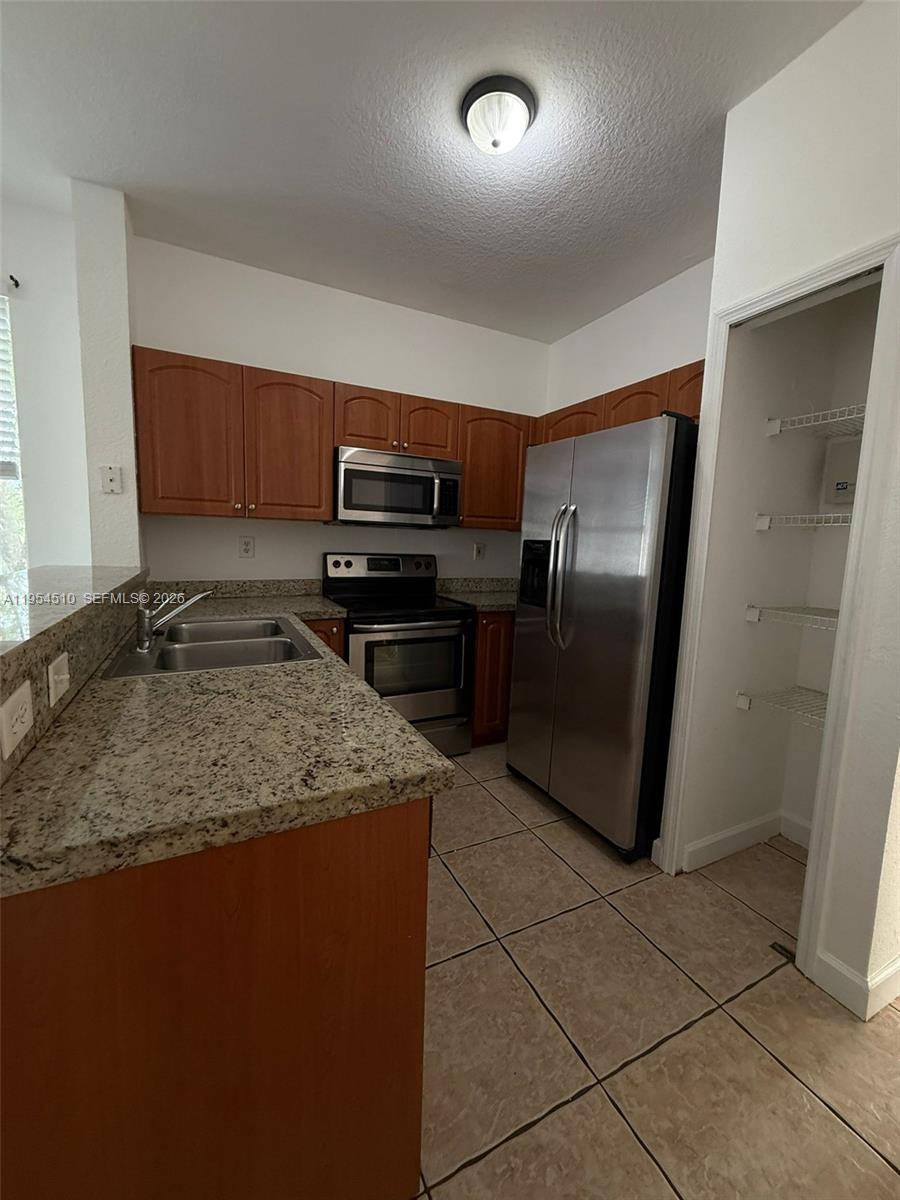 17640 NW 73rd AveHialeah - Condo 1-4 Stories,Condo condo unit 200-19 - picture