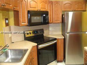 900 NE 209th TerMiami - Condo 1-4 Stories,Condo condo unit 104-31 - picture