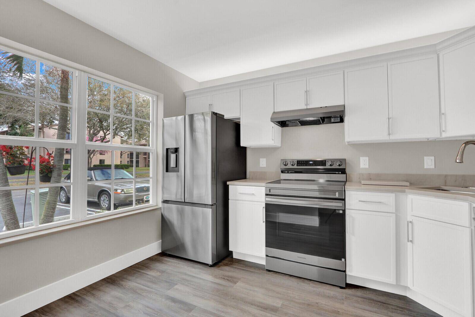 234 Foxtail - Charter Club of Palm Beach condo unit E - picture