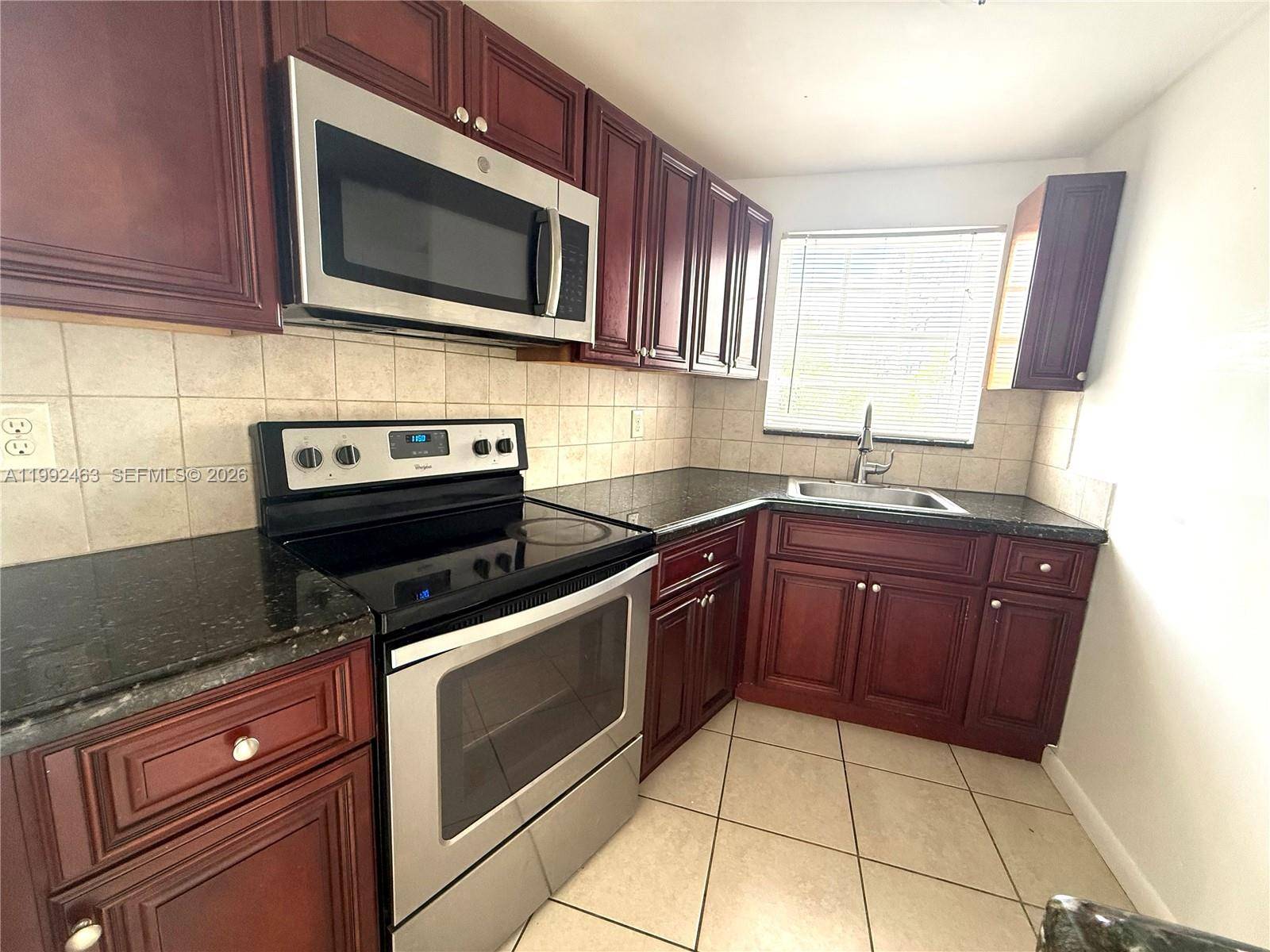 1780 79th St CswyNorth Bay Village - NO BAY WHITE HOUSE NO 3 C condo unit C214 - picture