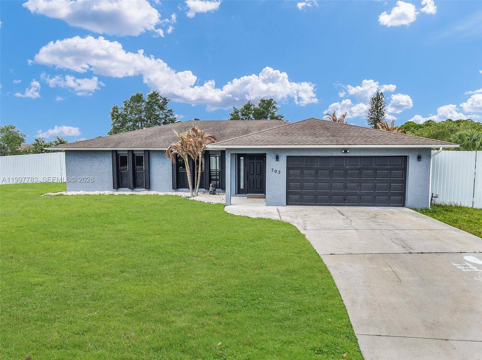 702 NW Orchid StPort St. Lucie - picture
