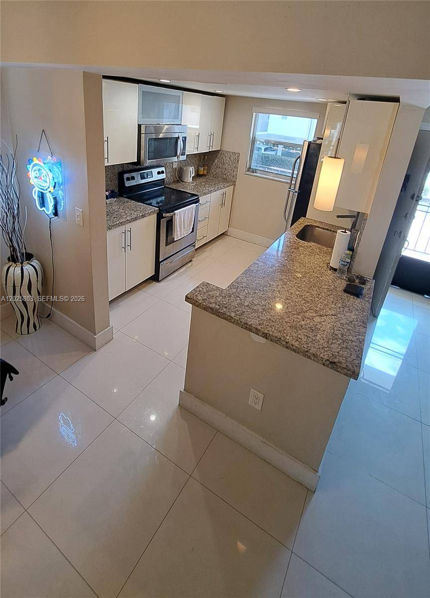 201 178th DrSunny Isles Beach - LE CARTIER CONDO condo unit 209 - picture