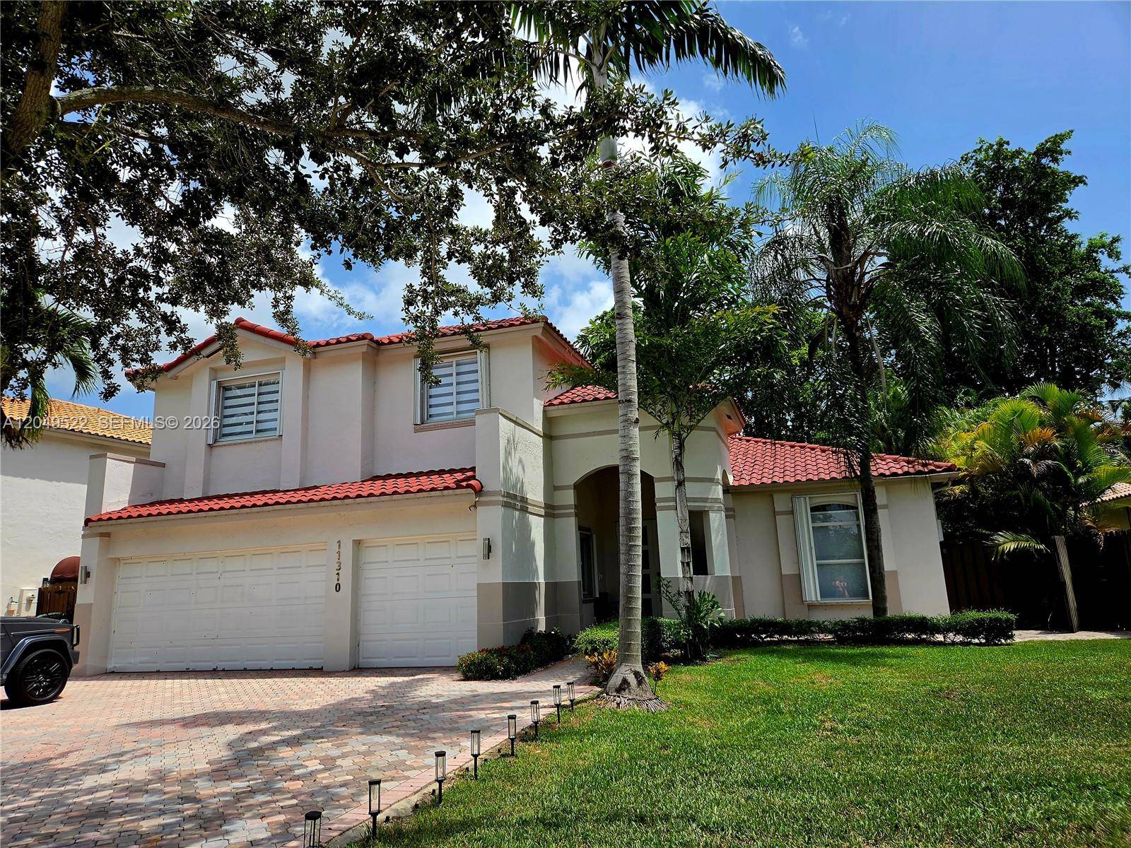 11310 NW 61st StDoral - DORAL ISLES RIVIERA condo unit . - picture