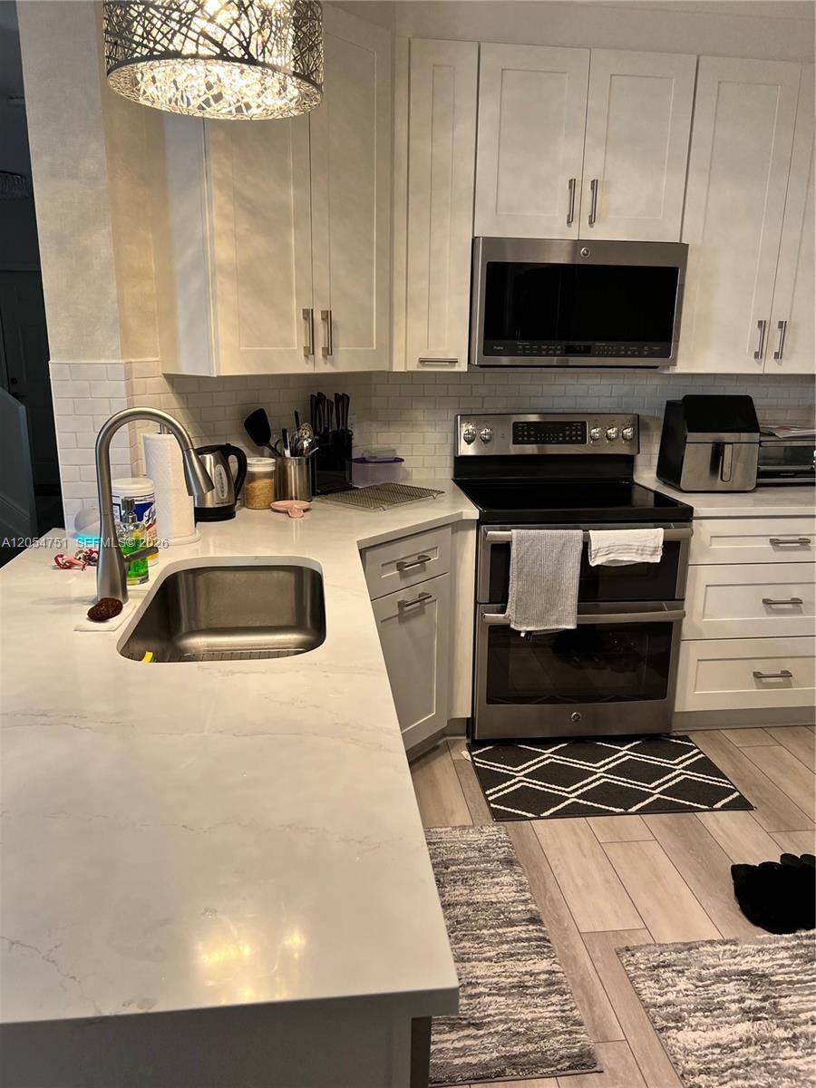 6010 Red Plum CtTamarac - LAND SECTION 8 condo unit 477 - picture